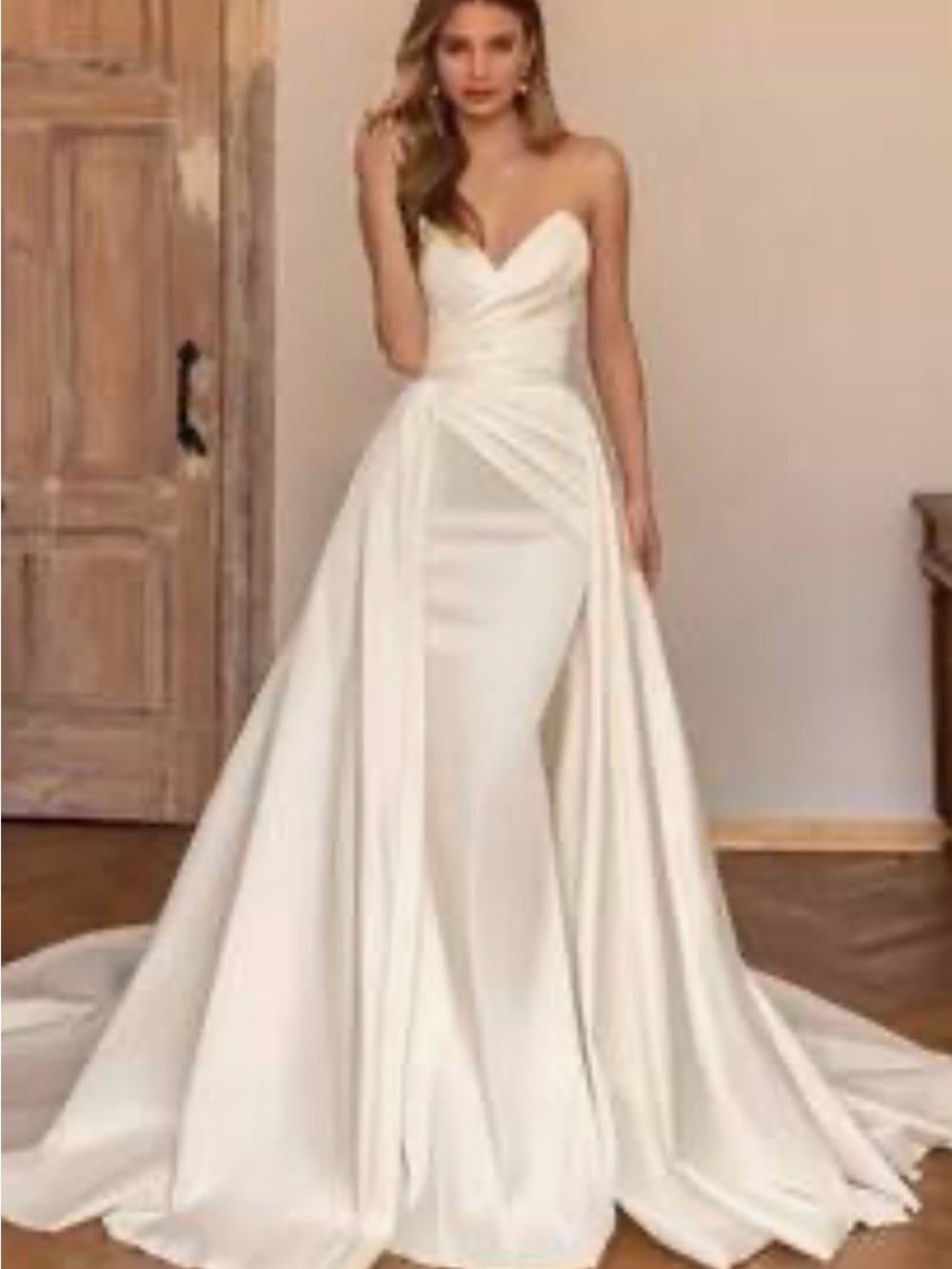 Elegant Strapless white Wedding Dress with removable skirt.